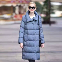 doudoune longue femme tendance 2018 fashion ultra légère chaude light down uniqlo moncler jott canada goose north face zara bleu grand col large chic classe