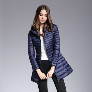 doudoune bleu navy tendance 2018 chic classe femme longue haute qualité duvet ultra fine légère à capuche parka couleur chaude uniqlo moncler jott canada goose north uniclo pas cher transportable en pochon